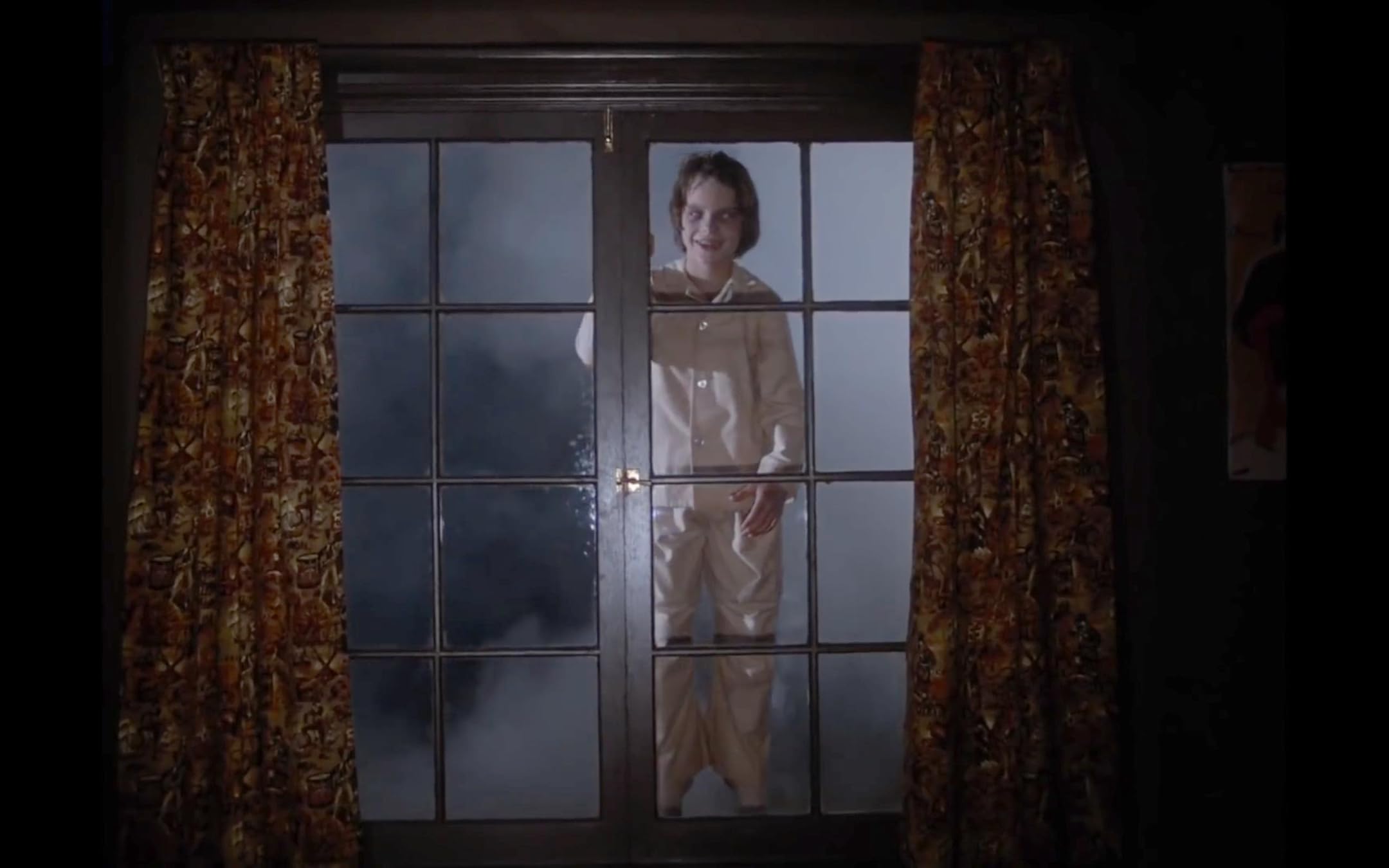 Child vampire floating outside of window in Salem's Lot (1979)